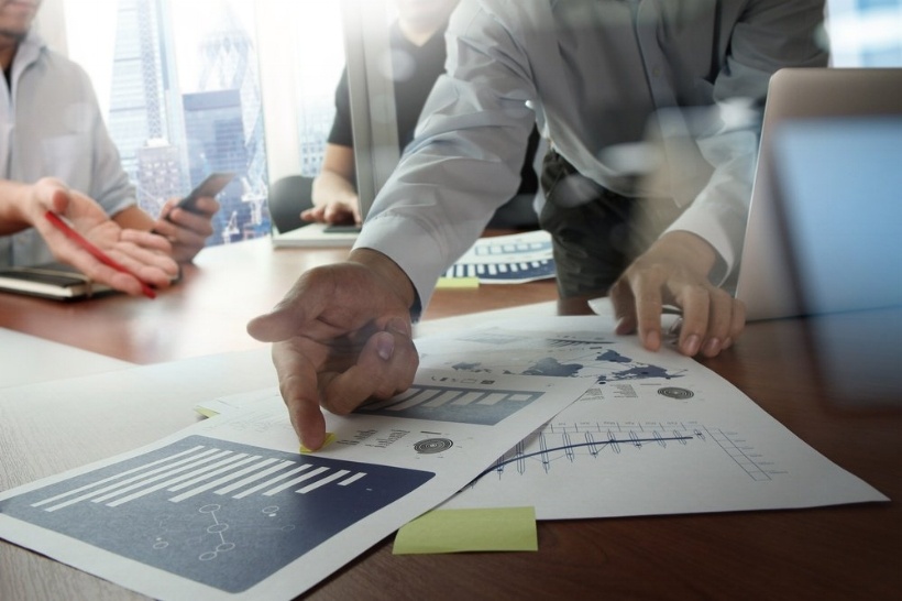 Double exposure of businessman hand working with new modern computer and business strategy as concept-573496-edited.jpeg